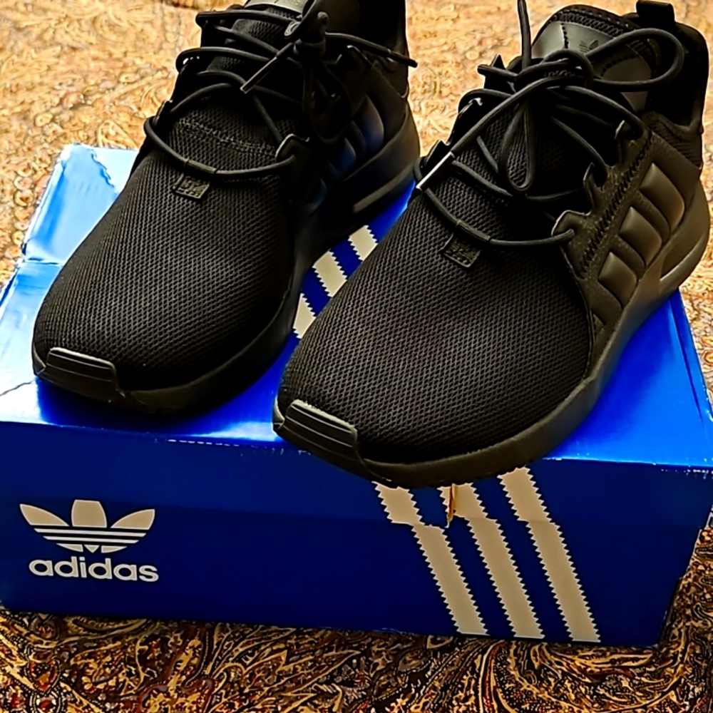 Adidas black sneakners X_PLR brand size big boys size 7.. never worn brand new